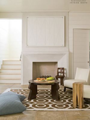 Modern fireplace design - hexagon rug fireplace concealed tv bates corkern veranda.jpg